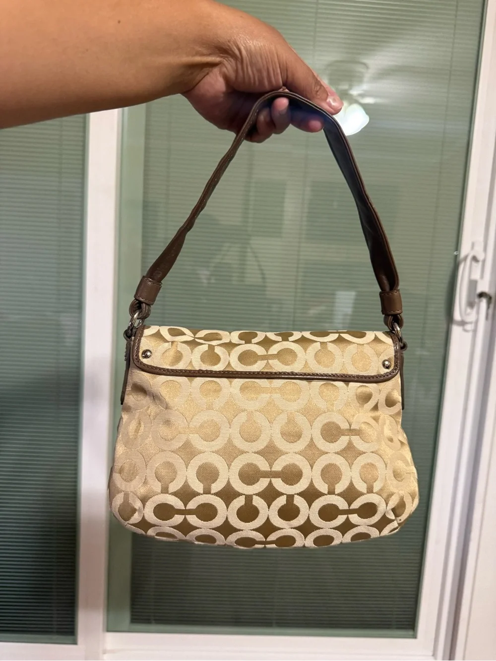 Coach elegant beige